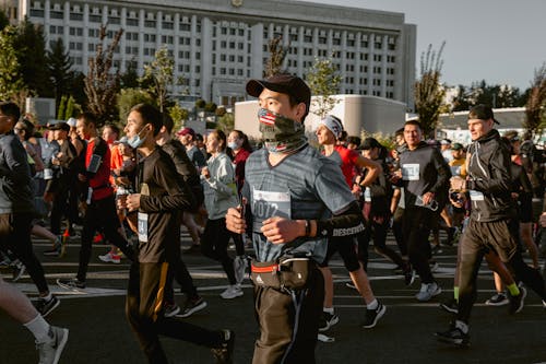 Free People Running at a Marathon Stock Photo