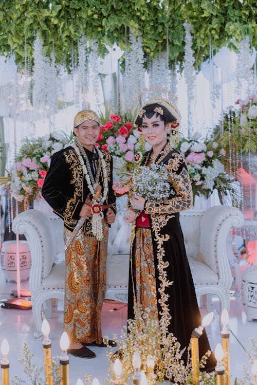 Couple Wearing Traditional Clothing on Wedding Day