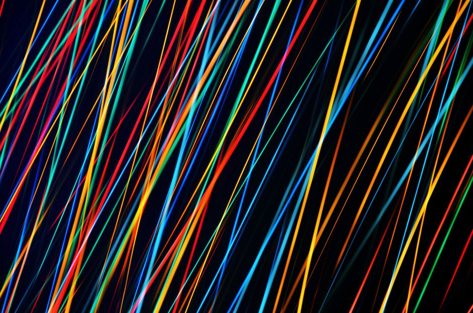 Abstract image featuring colorful light streaks set against a dark background, creating a dynamic and vibrant display. Abstract image featuring colorful light streaks set against a dark background, creating a dynamic and vibrant display.