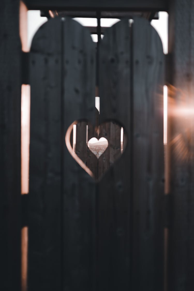 Heart Shape Cutout In Wooden Door 