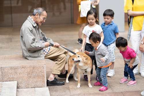 Man Holding a Dog's Leash