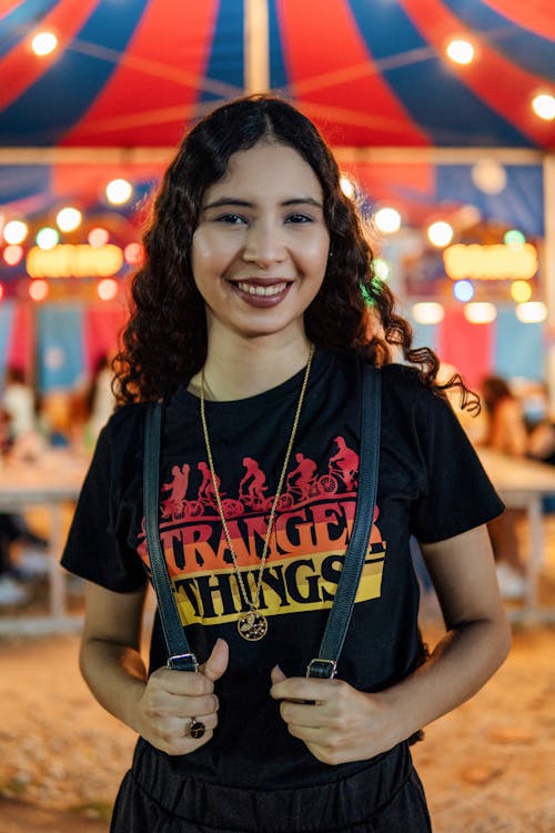 Photo of Woman in Black Shirt Smiling