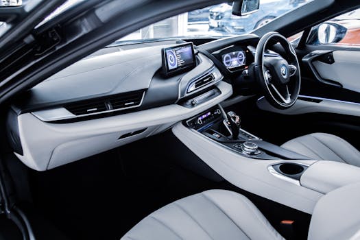 Explore the sleek, futuristic interior of a luxury BMW electric car, showcasing its advanced technology and design.
