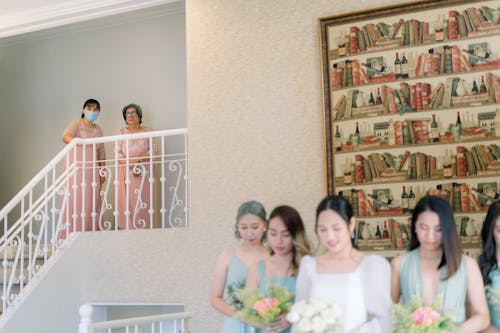 Group of Women with Bouquets in Exhibition House