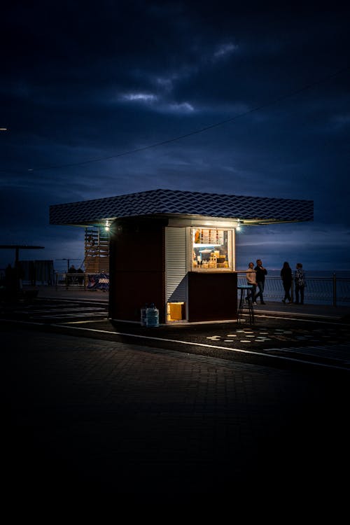 Foto profissional grátis de beira-mar, céu mal-humorado, noite