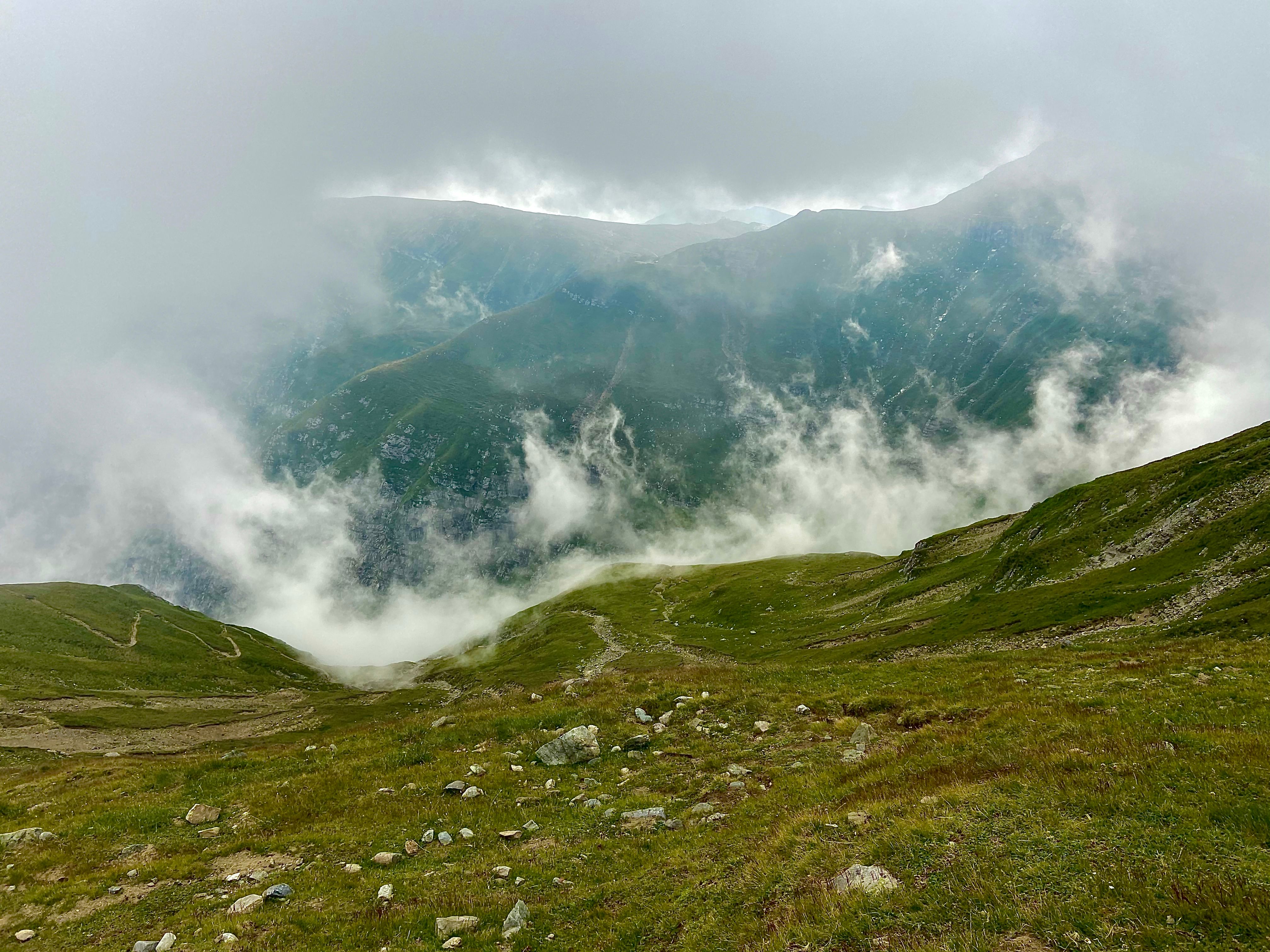 Aerial Photography of Cloudy Green Mountains · Free Stock Photo