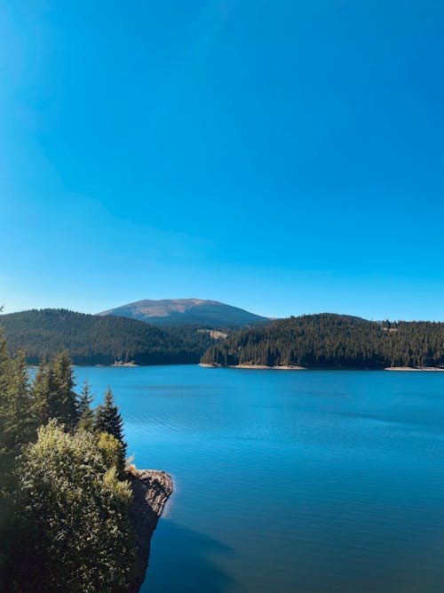 Blue Calm Lake under the Blue Sky