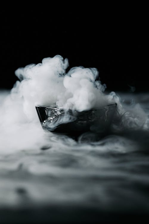 White Smoke in a Glass Container