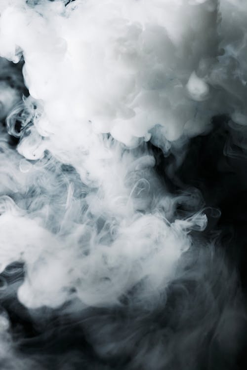 Close-Up Photo of a Thick White Smoke Plume