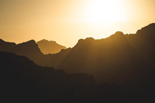 Free Stunning silhouette of mountains during the golden hour in Spanish landscape. Stock Photo
