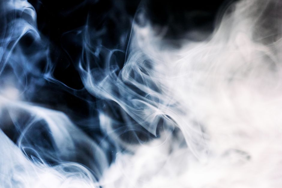 Mysterious swirling smoke creating ethereal abstract patterns and textures.