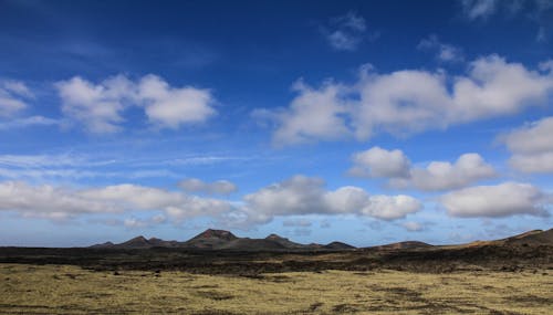 Free Mountains Under White Clouds Stock Photo