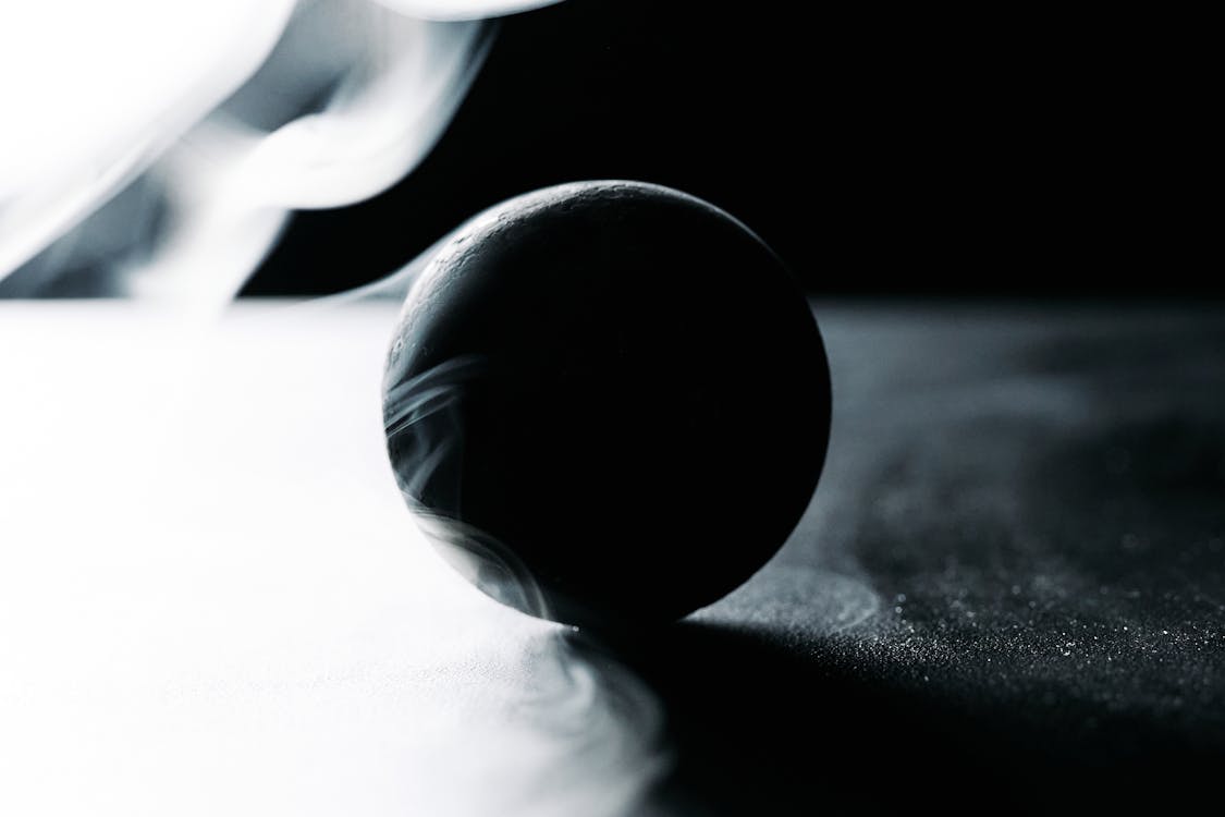 Close-Up Photo of a Black Ball