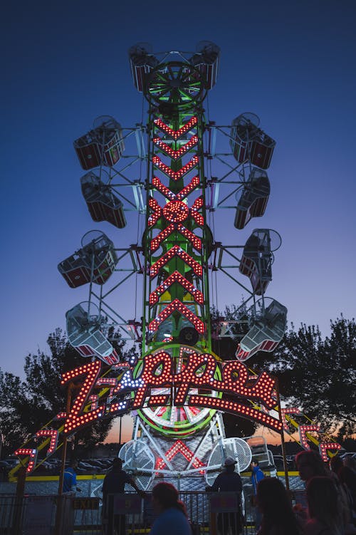 Carousel in an Amusement Park at Dusk 