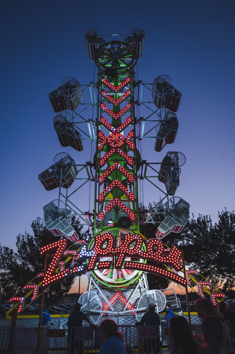 Carousel In An Amusement Park At Dusk 