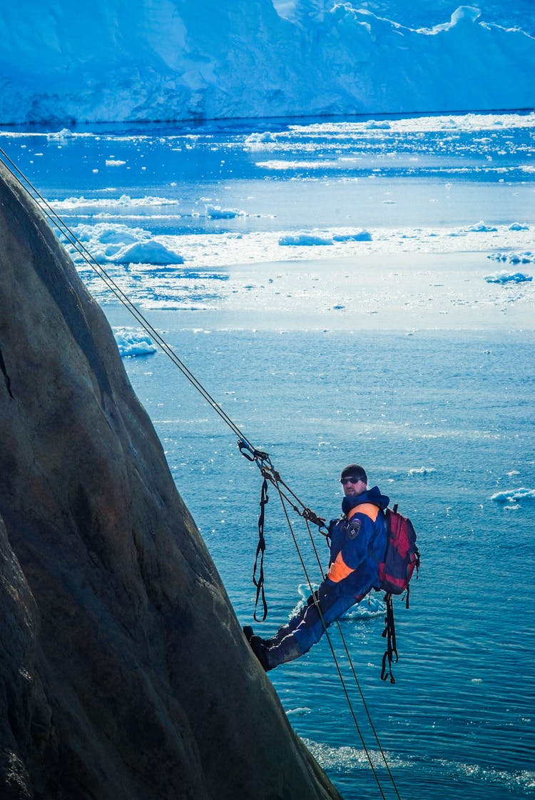 Man Rock Climbing 