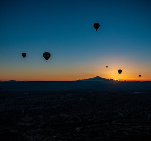 Photos gratuites de aube, avions, cappadoce