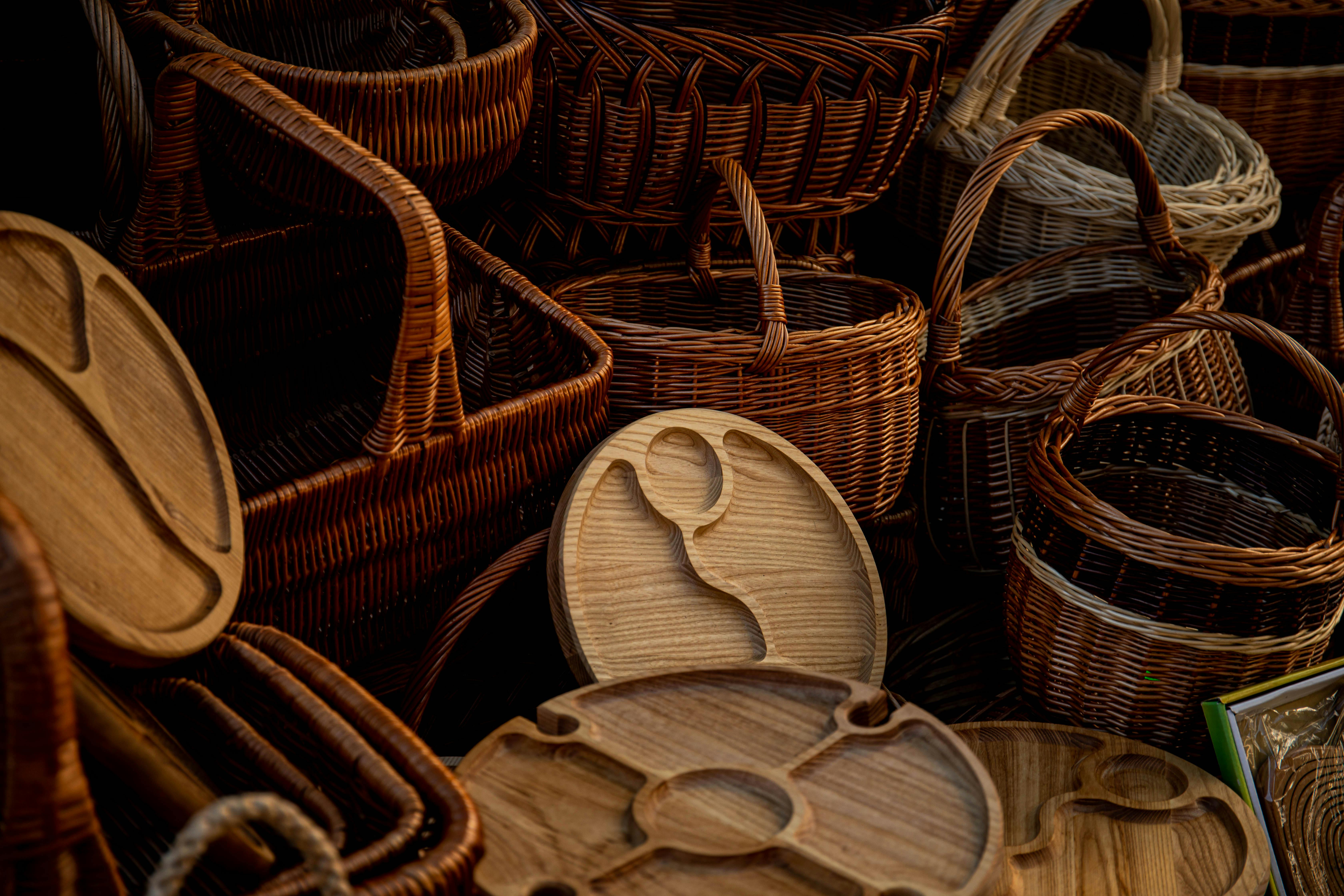 Variety of Woven Baskets and Wooden Trays · Free Stock Photo