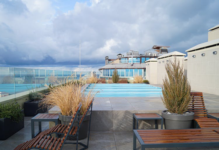 A Swimming Pool By A Hotel