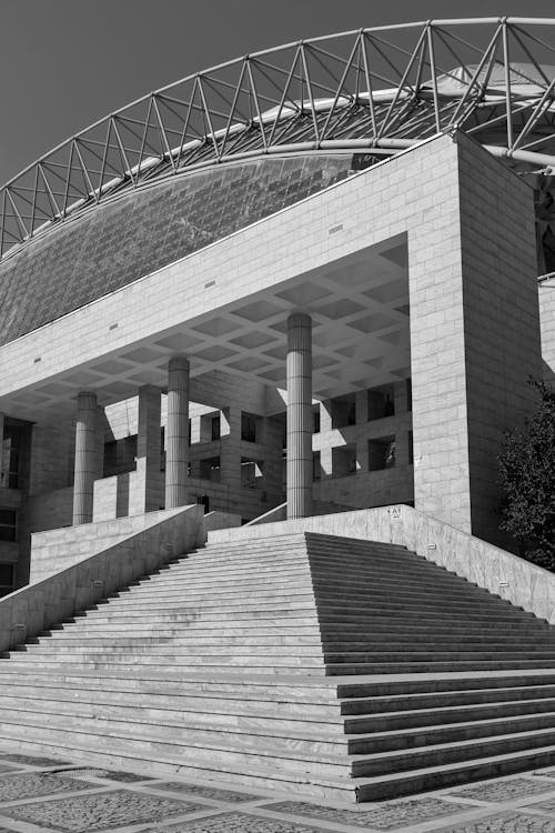 Grayscale Photo of Concrete Building