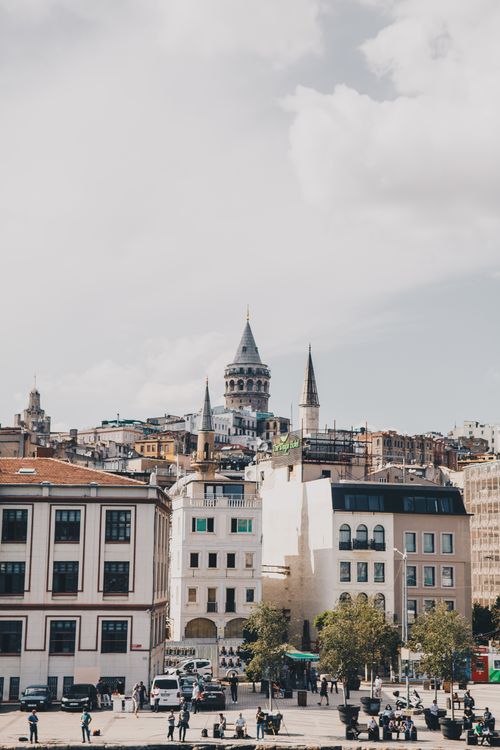 Free Scenic view of the iconic Galata Tower amidst Istanbul's cityscape with bustling streets below. Stock Photo