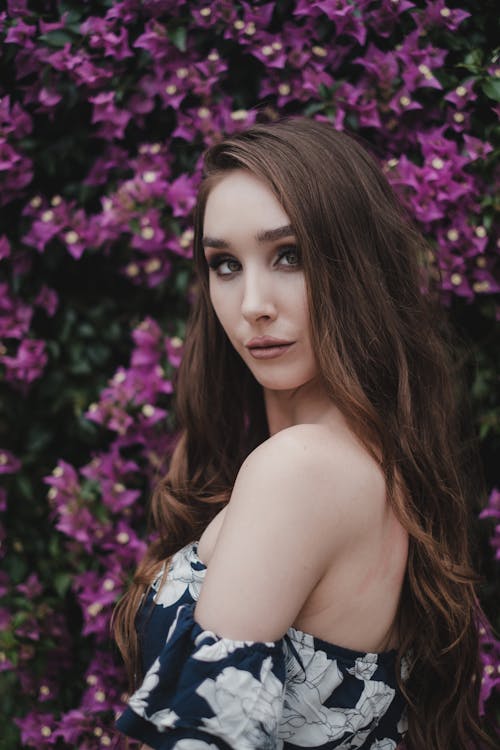 Close-Up Shot of a Beautiful Woman in Off Shoulder Dress