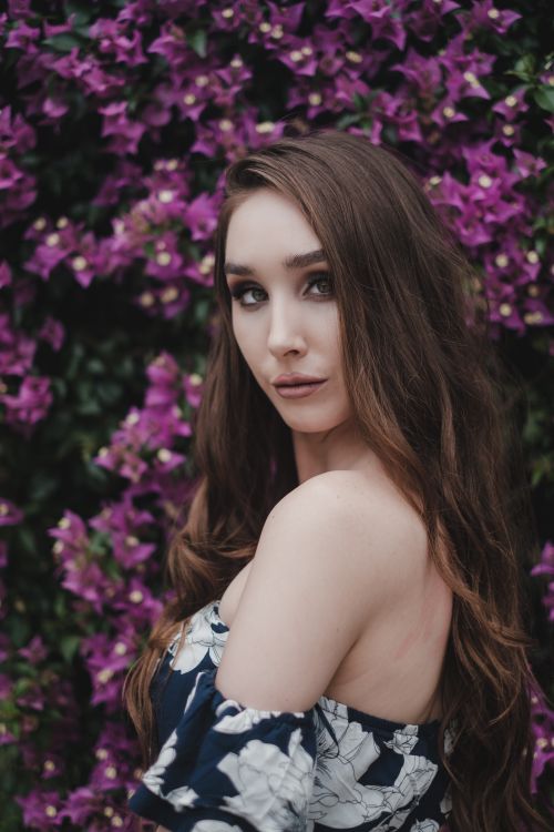Woman With Long Hair Wearing a Printed Dress · Free Stock Photo
