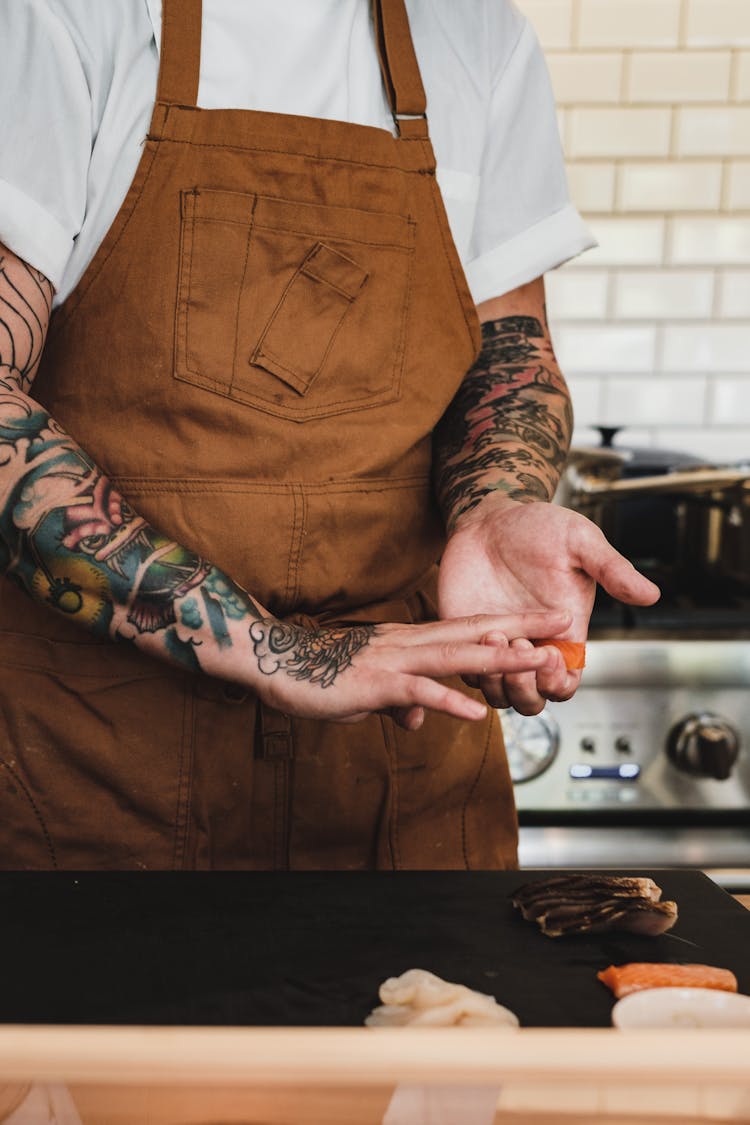 A Chef Making A Sushi