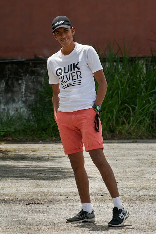 A Man in a White Shirt Posing