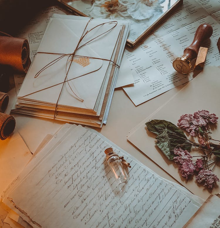 Letters And Envelopes On A Desk