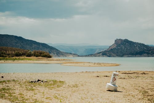 Mountain Ranges Near Body of Water 