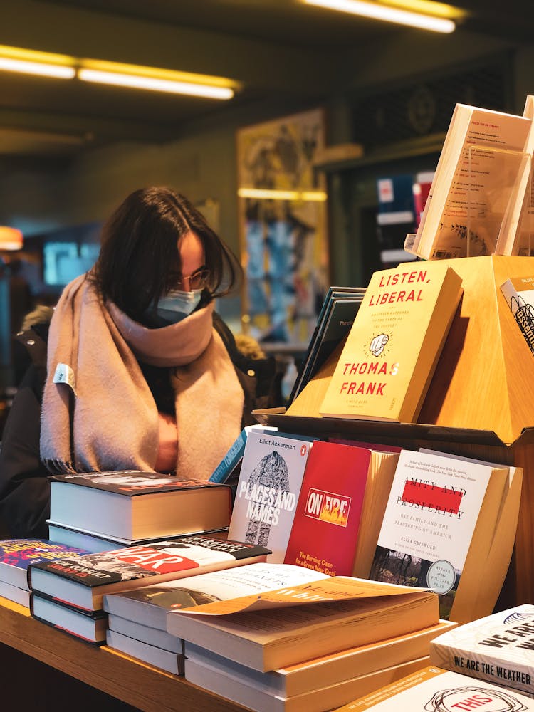 Woman Wearing Face Mask At The Bookstore