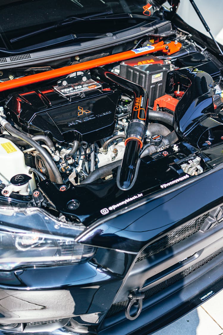 Black And Orange Mitsubishi Lancer Car Engine