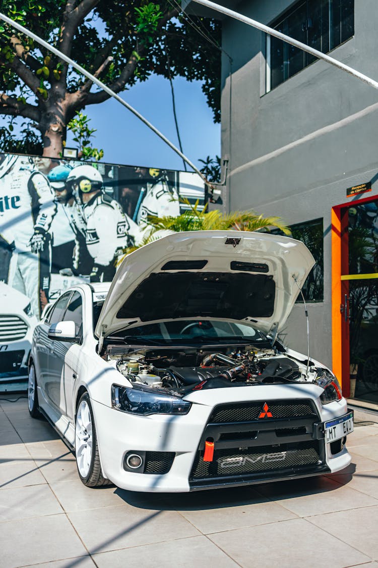 Mitsubishi Lancer With Open Hood