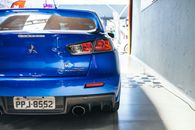 Back of Blue Mitsubishi Lancer