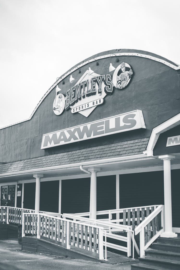 Grayscale Photo Of A Sports Bar 