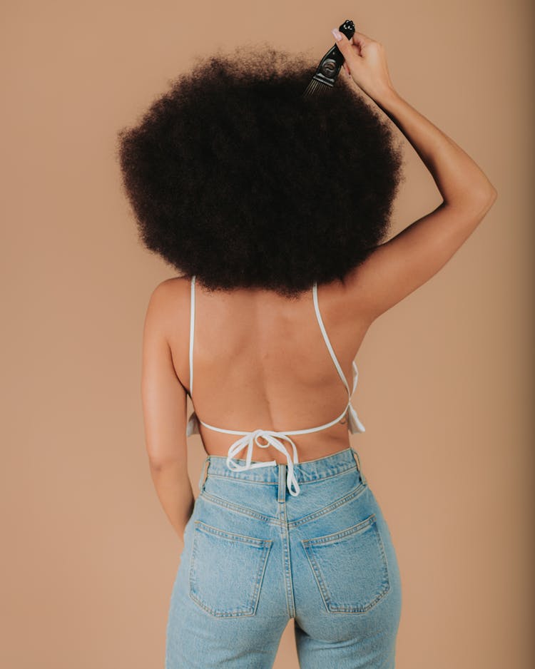 Rear View Portrait Of Woman With Afro