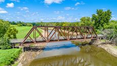 Brown Rusty Bridge Under Blue Sky