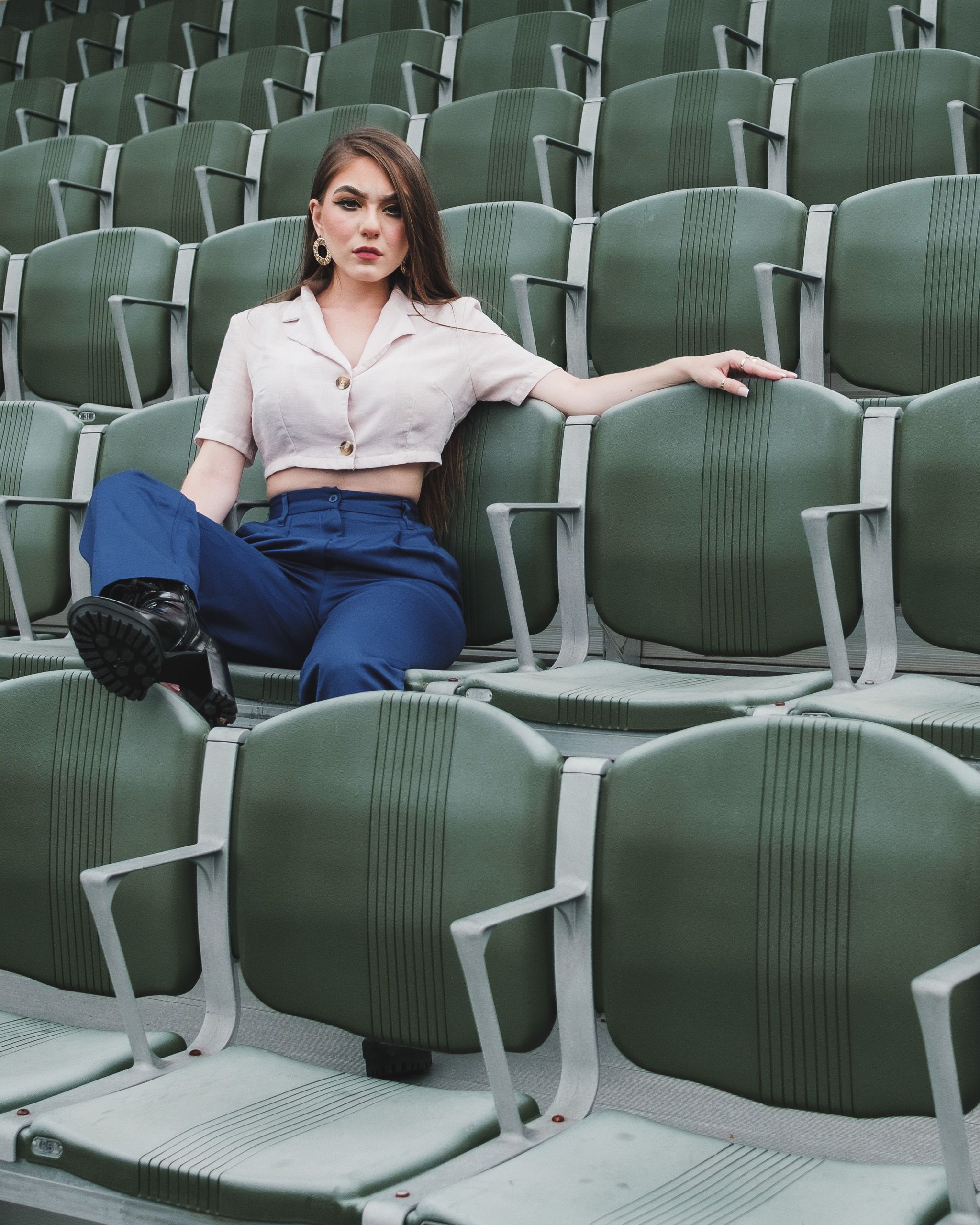 Woman in Beige Crop Top Sitting on Chair · Free Stock Photo