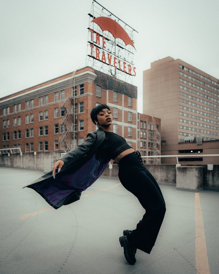 Woman Dancing On Street, Bending Back