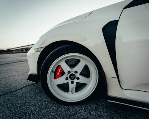 Free Close-Up Shot of Black and White Tire Stock Photo