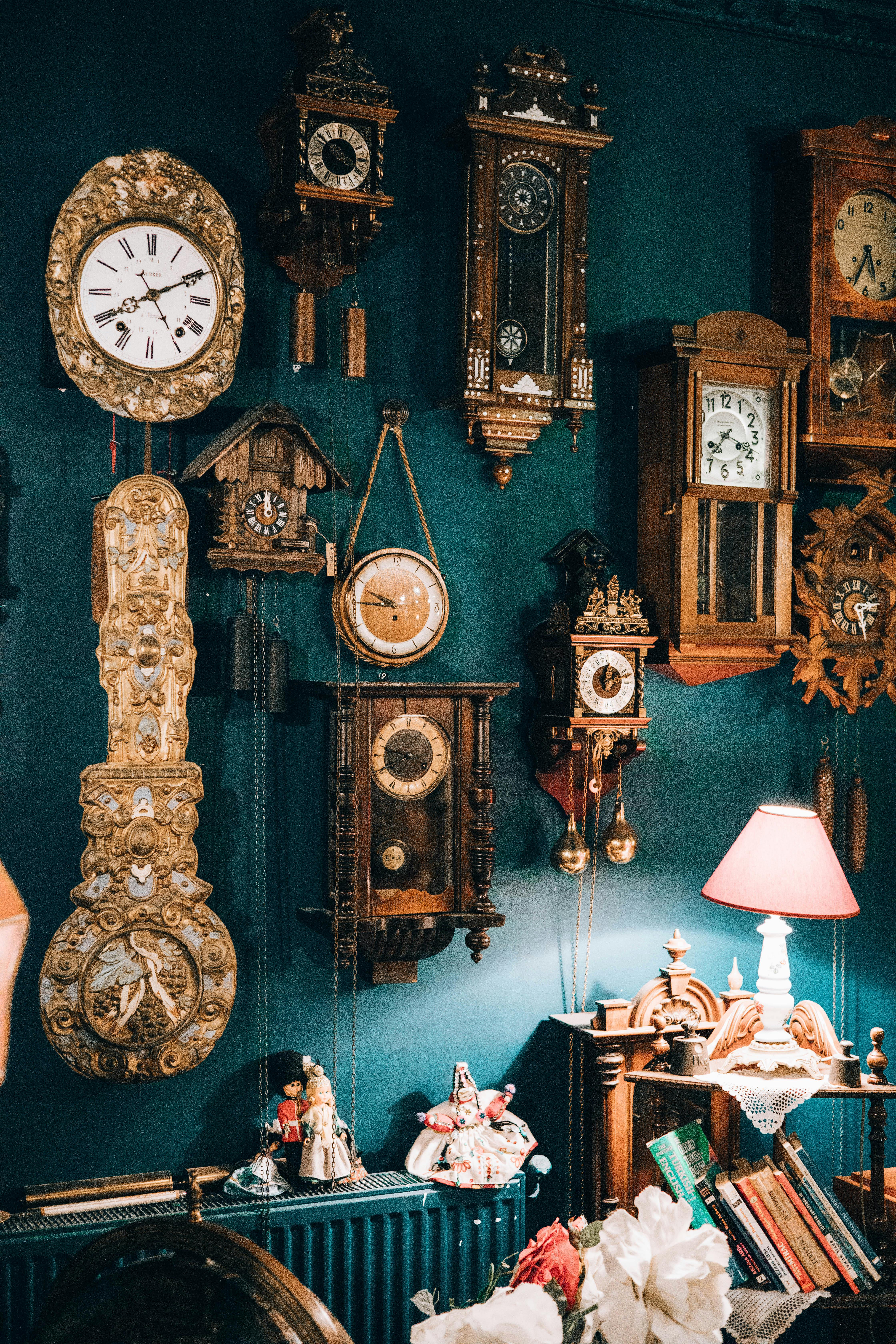 Antique Clocks Hanging on Wall · Free Stock Photo