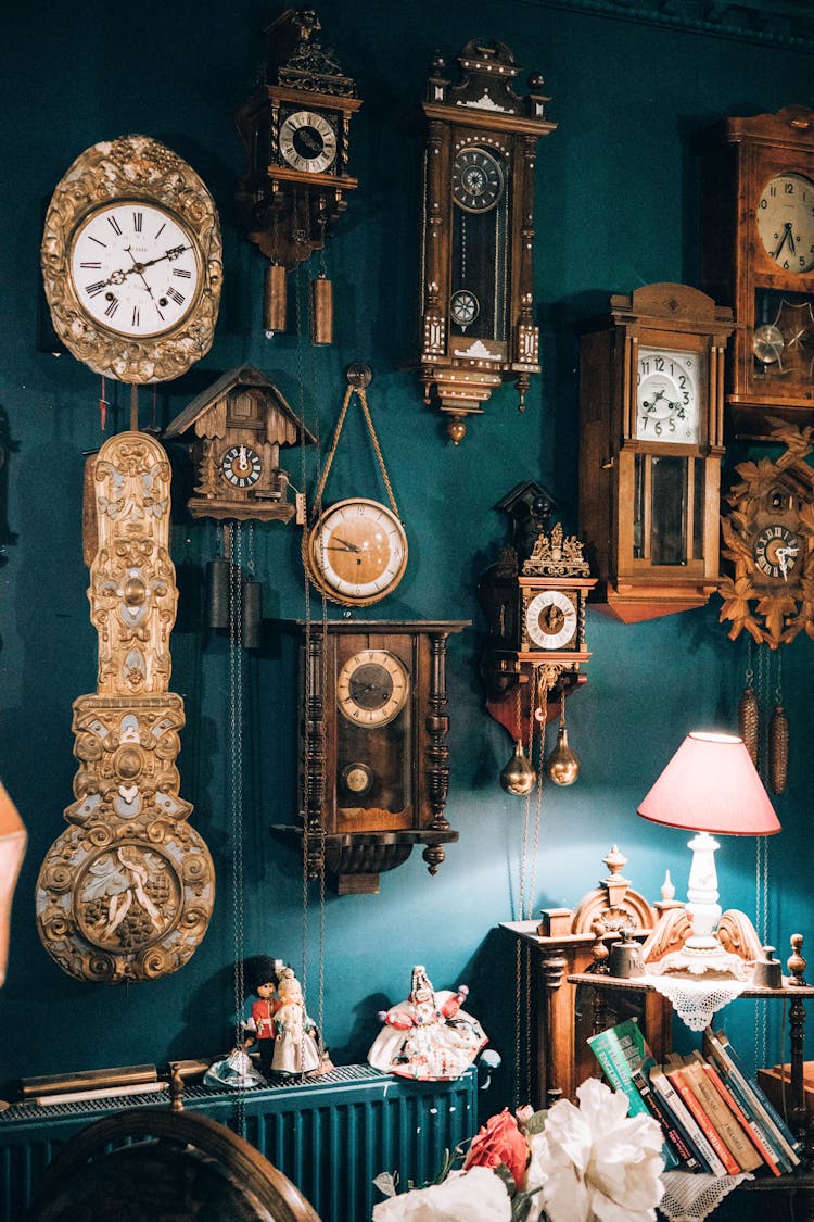 Antique Clocks Hanging On Wall