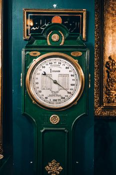 Green and White Antique Analog Gauge