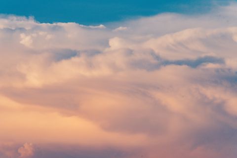A wide cloud bank folded by late sunlight — Duong Nhan on Pexels