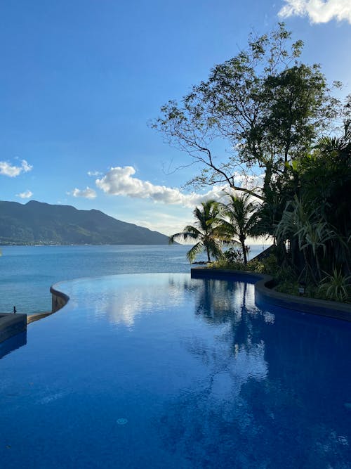 Gratis stockfoto met infinity pool, seychellen, strand