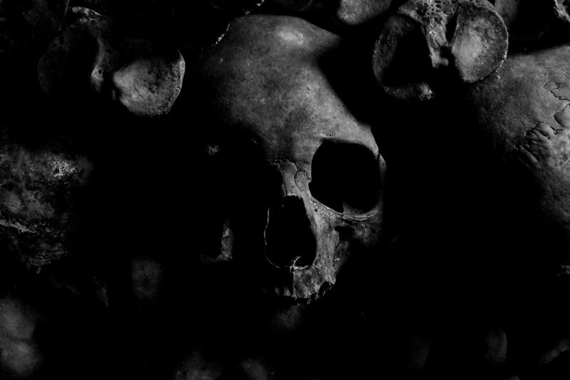 skulls catacombs dark
