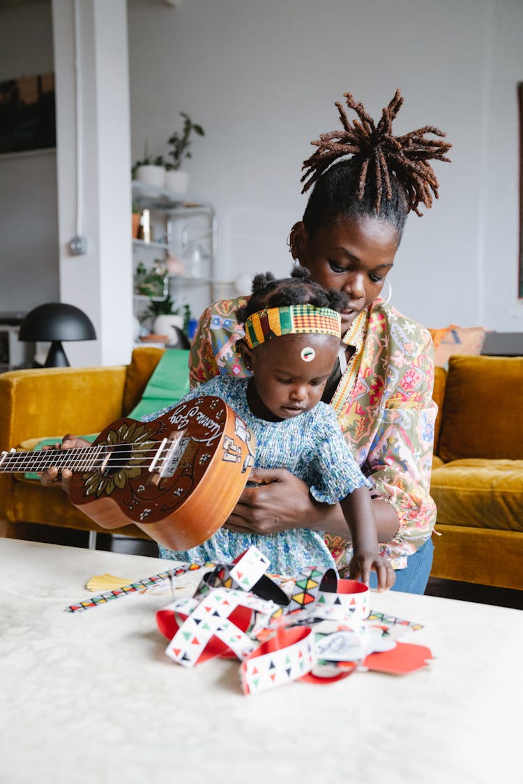 Mother And Daughter Playing Together