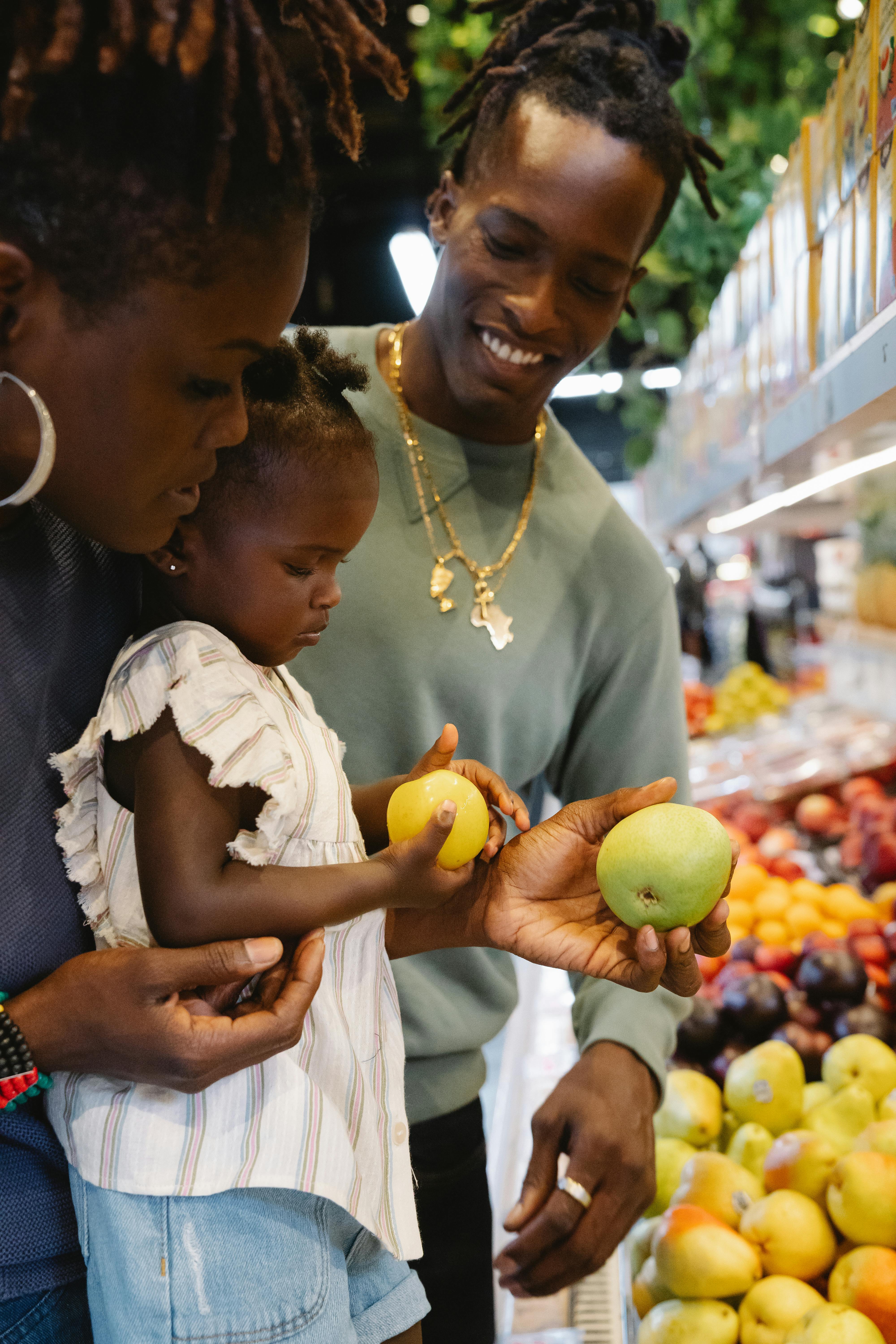 a family buying groceries in a supermarket