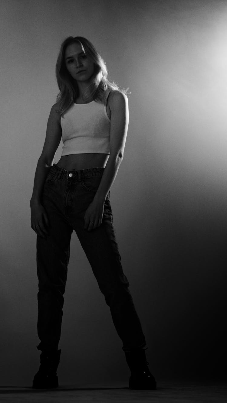 A Woman In White Crop Top